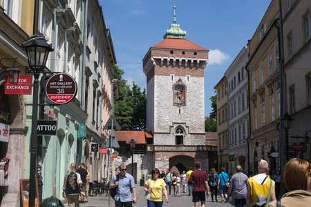 POLAND, KRAKOW - MAY 27, 2016: Krakow is the second largest and one of the oldest cities in Poland. Medieval tower of the Florian Gate in Krakow, Poland.のeditorial素材