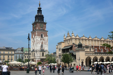 POLAND, KRAKOW - MAY 27, 2016: Town Hall and Cloth Hall in the Main Market Square of the Old City in Krakow.のeditorial素材