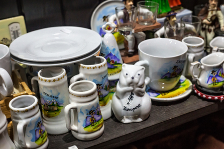 POLAND, ZAKOPANE - JANUARY 03, 2015: Souvenirs  in a shop window in Zakopane. Town known as the winter capital of Poland. It is a popular destination for tourism.のeditorial素材