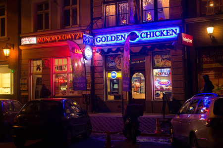 POLAND, GDANSK - DECEMBER 12, 2014: Night shops in the historic part of town. Gdansk is a Polish city on the Baltic coast and popular center of tourism.のeditorial素材