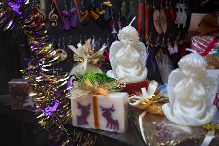 POLAND, KRAKOW - JANUARY 01, 2015: Christmas souvenirs and other gifts for tourists in a shop window.のeditorial素材