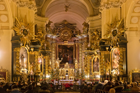 POLAND, KRAKOW - JANUARY 01, 2015: Inside of the catholic monastery Church of Sts. Bernardine of Siena with Christmas decorations. The interiors of the church made in baroque style.のeditorial素材