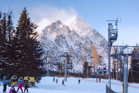 SLOVAKIA, STRBSKE PLESO - JANUARY 06, 2015: Cable cars in Strbske Pleso near Predne Solisko Peak. The village is a favorite ski and health resort in the slovakian part of High Tatras mountains.のeditorial素材