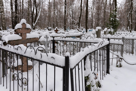 Old Red (Bugrovsky) cemetery in the Nizhny Novgorod at winter. Russia. The present cemetery was planned at the turn of the 1880s-90s. The actual formation occurred during the First World War.の写真素材