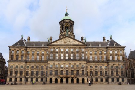 AMSTERDAM, NETHERLANDS - JUNE 25, 2017:  View to the Royal Palace of Amsterdam on the Dam Square. The palace was built as a city hall during the Dutch Golden Age in the 17th century.