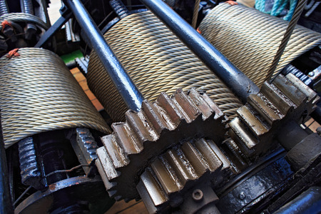 Metal winch on a sailing ship.の写真素材