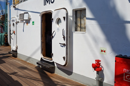 KALININGRAD, RUSSIA - JUNE 19, 2016: Metal deckhouse on the barque Kruzenshtern (prior Padua) moored in the Kaliningrad Sea Port. The ship launched in 1926 and was surrendered to the USSR in 1946.のeditorial素材