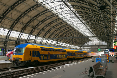 AMSTERDAM, NETHERLANDS - JUNE 25, 2017: Interior of the Amsterdam Central Station. Centraal is the...