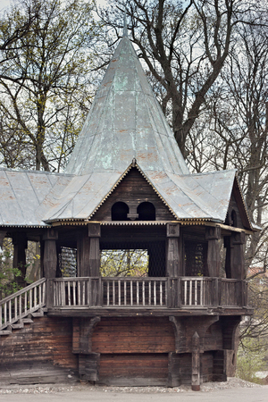 KALININGRAD, RUSSIA - MARCH 29, 2014: Old shabby wooden buildings in a fairy style in the recreation area of ââthe Kaliningrad zoo. The Zoo was founded in 1896 as the Konigsberger Tiergarten.のeditorial素材