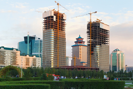 ASTANA, KAZAKHSTAN - JULY 25, 2017: View of the modern multistorey buildings under construction in the center of Astana city. Astana is the capital city of Kazakhstan and the second-largest city.のeditorial素材