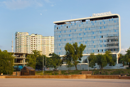 ALMATY, KAZAKHSTAN - JULY 27, 2017: View of the hotel "Novotel" building in center of Almaty at summertime. Almaty is the largest city in Kazakhstan.のeditorial素材
