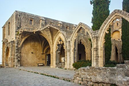 Ruins of the Abbey of Bellapais in the Northern Cyprus. Bellapais Abbey is the ruin of a monastery built by Canons Regular in the 13th century near the Kyrenia.の写真素材