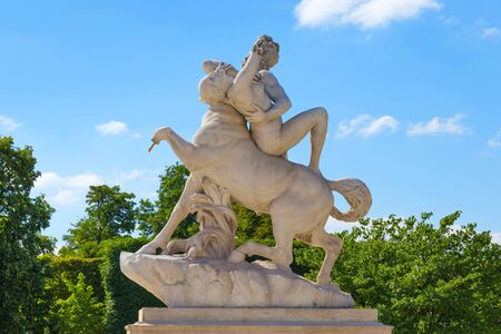 View of the marble sculpture Nessus and Deianira (1892) by Laurent Marqueste (1848-1920) in the Tuileries Park, Paris, France.の写真素材