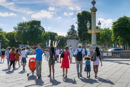 PARIS, FRANCE - JUNE 23, 2017: Unknown people walking and visit the sights in the historic center of Paris in the summertime.のeditorial素材