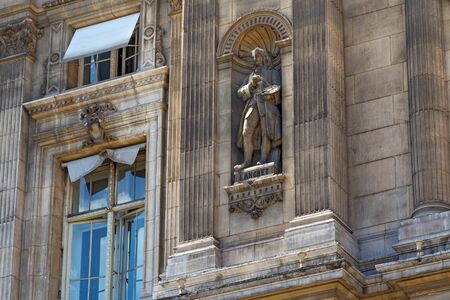 PARIS, FRANCE - JUNE 23, 2017: Sculpture of a famous French painter Nicolas Lancret (1690-1743) in a wall niche of the Hotel de Ville (City Hall) in Paris.のeditorial素材