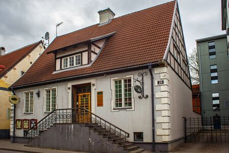 PARNU, ESTONIA - MAY 02, 2015: Old stone building with half-timbered elements in historical center of Parnu on the Kuninga street.のeditorial素材