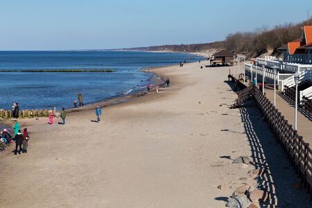 ZELENOGRADSK, KALININGRAD REGION, RUSSIA - APRIL 02, 2019: View of the sandy beach on the Baltic Sea coast in famous resort Zelenogradsk (formerly known as Cranz) at spring time.のeditorial素材
