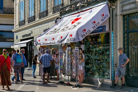 PARIS, FRANCE - JUNE 23, 2017: Street tent for the sale of souvenirs in the center of Paris on the Avenue des Champs-Elysees.のeditorial素材