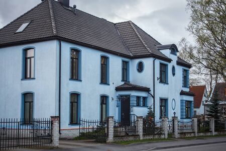 PARNU, ESTONIA - MAY 02, 2015: Large old stone blue building in historical center of Parnu.のeditorial素材