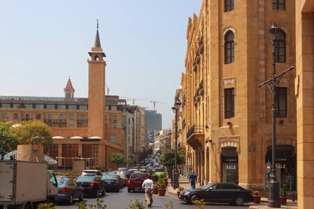 BEIRUT, LEBANON - AUGUST 14, 2014: Rush hour in Beirut downtown and view of the historical Al-Omari Grand Mosque at summer sunny day.のeditorial素材
