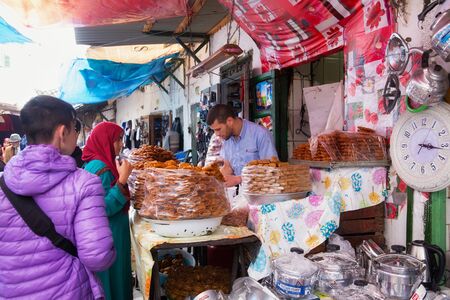 TETOUAN, MOROCCO - MAY 24, 2017: Sale of sweets on the old food market in historical part of Tetouan in Northern Morocco.のeditorial素材