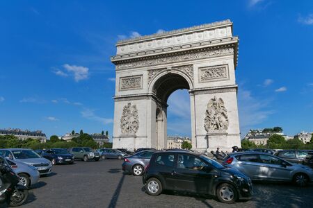 PARIS, FRANCE - JUNE 23, 2017: View of the famous Triumphal Arch. The Arc de Triomphe honours those who fought and died for France in the French Revolutionary and Napoleonic Wars.のeditorial素材