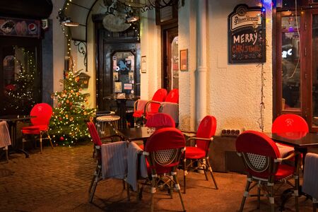 SOPOT, POLAND - DECEMBER 20, 2017: Night view of the street terrace of the Blekitny Pudel Pub in Christmas decoration on the Heroes of Monte Cassino Street in Sopot.のeditorial素材