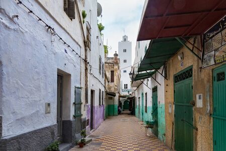 TETOUAN, MOROCCO - MAY 24, 2017: Green wooden doors of the old stores in Tetouan Medina quarter in Northern Morocco. A medina is typically walled, with many narrow and maze-like streets.のeditorial素材