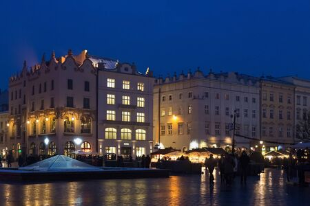 KRAKOW, POLAND - JANUARY 06, 2016: Night winter view of the Main Market Square in historical center of Krakow near Christmas fairs.のeditorial素材