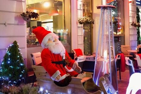 SOPOT, POLAND - DECEMBER 20, 2017: Christmas decoration near restaurant on the Heroes of Monte Cassino St. Residential property surrounding the street is in a minority - mainly restaurants and shops.のeditorial素材