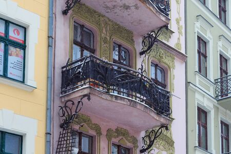 TORUN, POLAND - JANUARY 08, 2016: Wrought iron balcony of one of the old buildings in the historical part of the city. Torun is one of the oldest cities in Poland.のeditorial素材