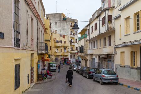 TANGIER, MOROCCO - MAY 26, 2017: Old yellow residential buildings in the historical part of Tangier in Northern Morocco.のeditorial素材