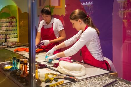 TORUN, POLAND - JANUARY 08, 2016: Production candy as open show in the polish sweet food store Manufaktura Cukierkow in Torun.のeditorial素材