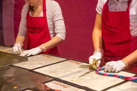 TORUN, POLAND - JANUARY 08, 2016: Production candy as open show in the polish sweet food store Manufaktura Cukierkow in Torun.のeditorial素材