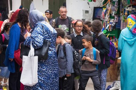 TETOUAN, MOROCCO - MAY 24, 2017: Unknown locals people on the one of the streets of Tetouan Medina in Northern Morocco.のeditorial素材