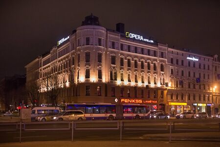 RIGA, LATVIA - JANUARY 14, 2018: Night winter view of the old historical buildings in central part of Riga near Central Railway Station.のeditorial素材