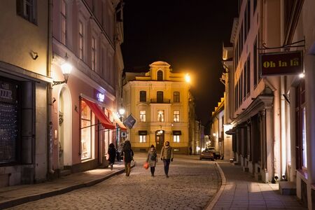 TALLINN, ESTONIA - JANUARY 12, 2018: Night view of the old buildings in the historical part of...