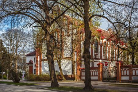 PARNU, ESTONIA - MAY 02, 2015: Old building of the Vanalinna school in historical center of Parnu on the Nikolai street at springtime.のeditorial素材
