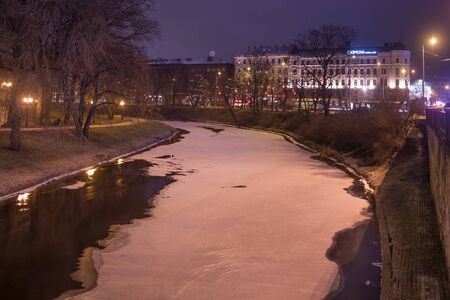 RIGA, LATVIA - JANUARY 14, 2018: Night winter view of the Bastion Hill town park in historical part of Riga.のeditorial素材