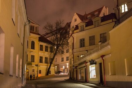 TALLINN, ESTONIA - JANUARY 12, 2018: Night view of the old buildings in the historical part of Tallinn. The city is the capital and the most populous city of Estonia.のeditorial素材