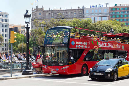BARCELONA, SPAIN - MAY 16, 2017: View of the red city tour bus in historical center of Barcelona in sunny day.のeditorial素材