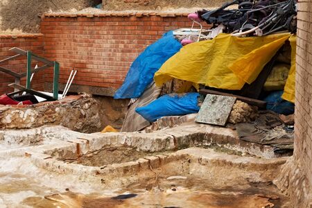 Different empty stone vats for leather at Tannery of Tetouan Medina. Northern Morocco.の写真素材