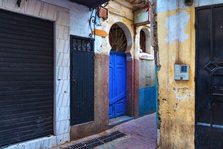 View of the one of the old street in the Tangier Medina quarter in Northern Morocco. A medina is typically walled, with many narrow and maze-like streets.の写真素材
