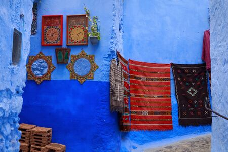 View of the blue walls of Medina quarter in Chefchaouen, Morocco. The city, also known as Chaouen is noted for its buildings in shades of blue and that makes Chefchaouen very attractive to visitors.の写真素材