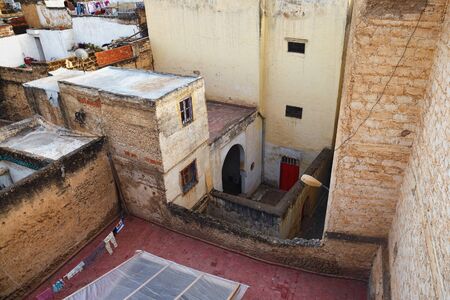 View of the old buildings roofs in medina quarter of Fez in Morocco. The medina of Fez  is believed...