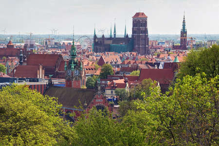 GDANSK, POLAND - MAY 14, 2017: Panorama of the old town in the historical part of Gdansk. With view of the St Mary's Church (Is currently one of the two or three largest brick churches in the world).のeditorial素材
