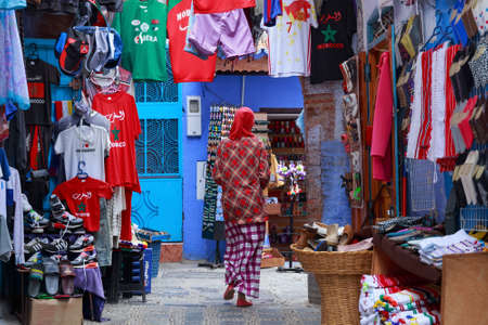 CHEFCHAOUEN, MOROCCO - MAY 28, 2017: Unknown people in Medina in Chaouen. The city is noted for its buildings in shades of blue and that makes Chefchaouen very attractive to visitors.のeditorial素材
