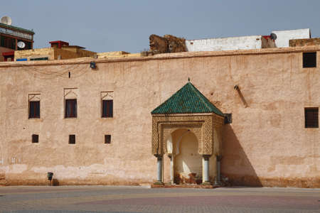 Part of the historical wall on the Lahdim square in Meknes. Meknes is one of the four Imperial...