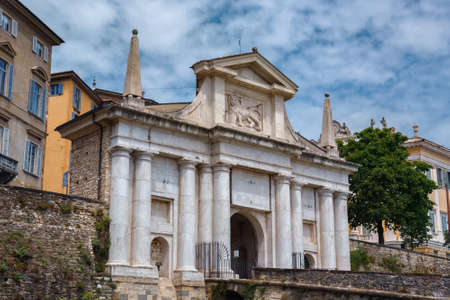 View of the Porta San Giacomo gate in Bergamo. Its gate, leading through the Venetian walls to the upper city of Bergamo, was built in 1592 from pinkish-white marble.のeditorial素材