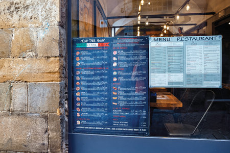 BERGAMO, ITALY - MAY 22, 2019: Menu of the Goss Quality Burger restaurant on the Via Bartolomeo Colleoni street in Upper Bergamo (Citta Alta).のeditorial素材